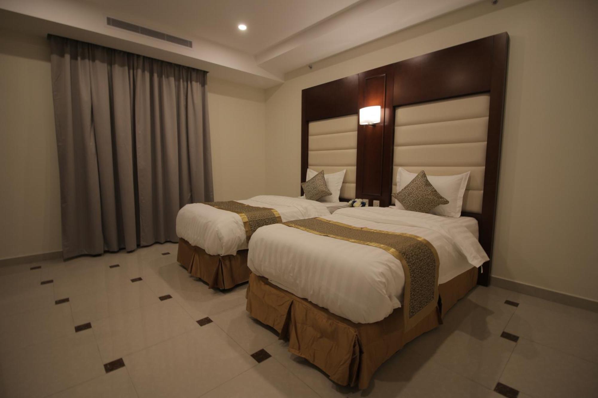 Nukhbat Al Makan Apartment Hotel Ta'if Quarto foto